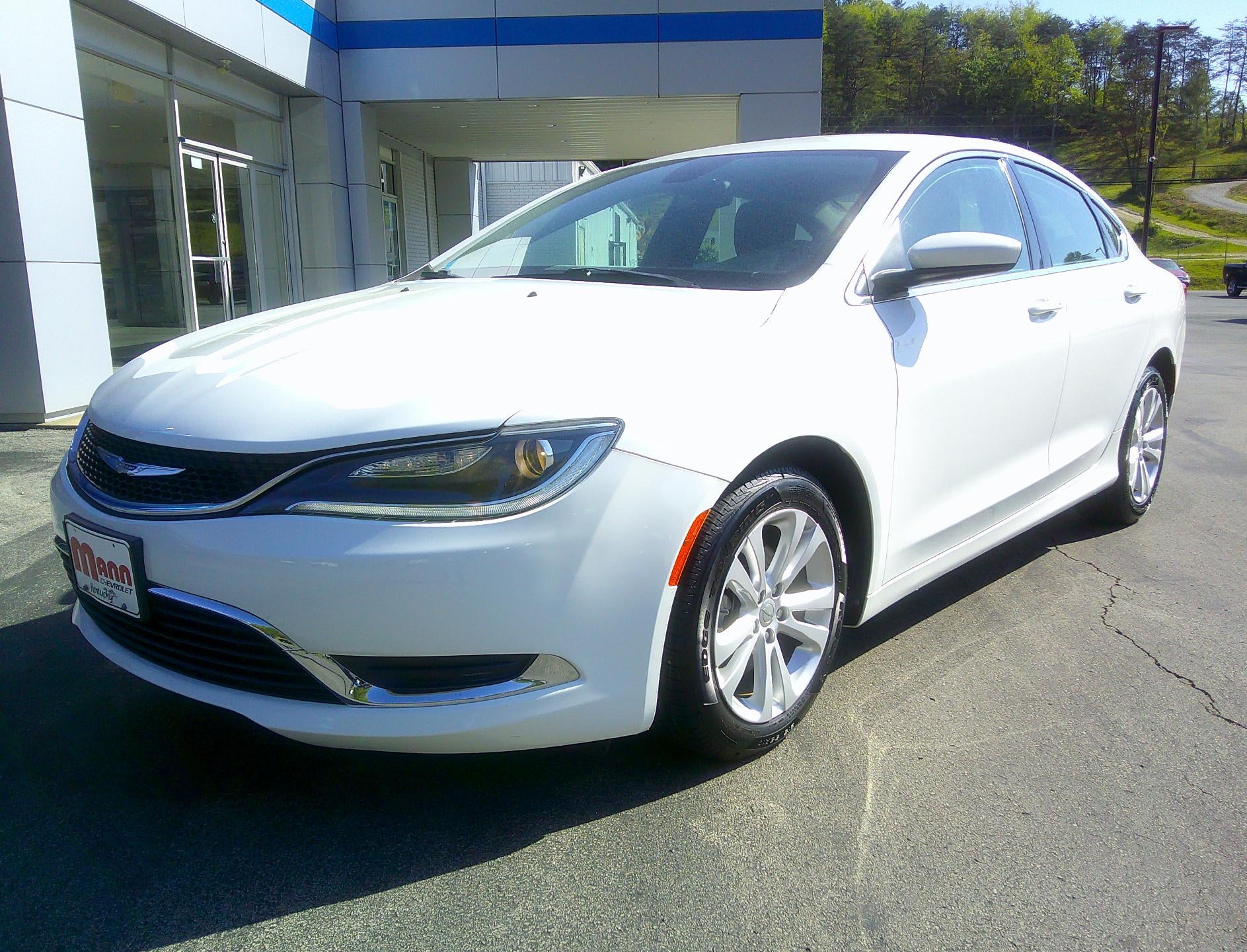 2015 Chrysler 200 Limited in White — front three-quarter view