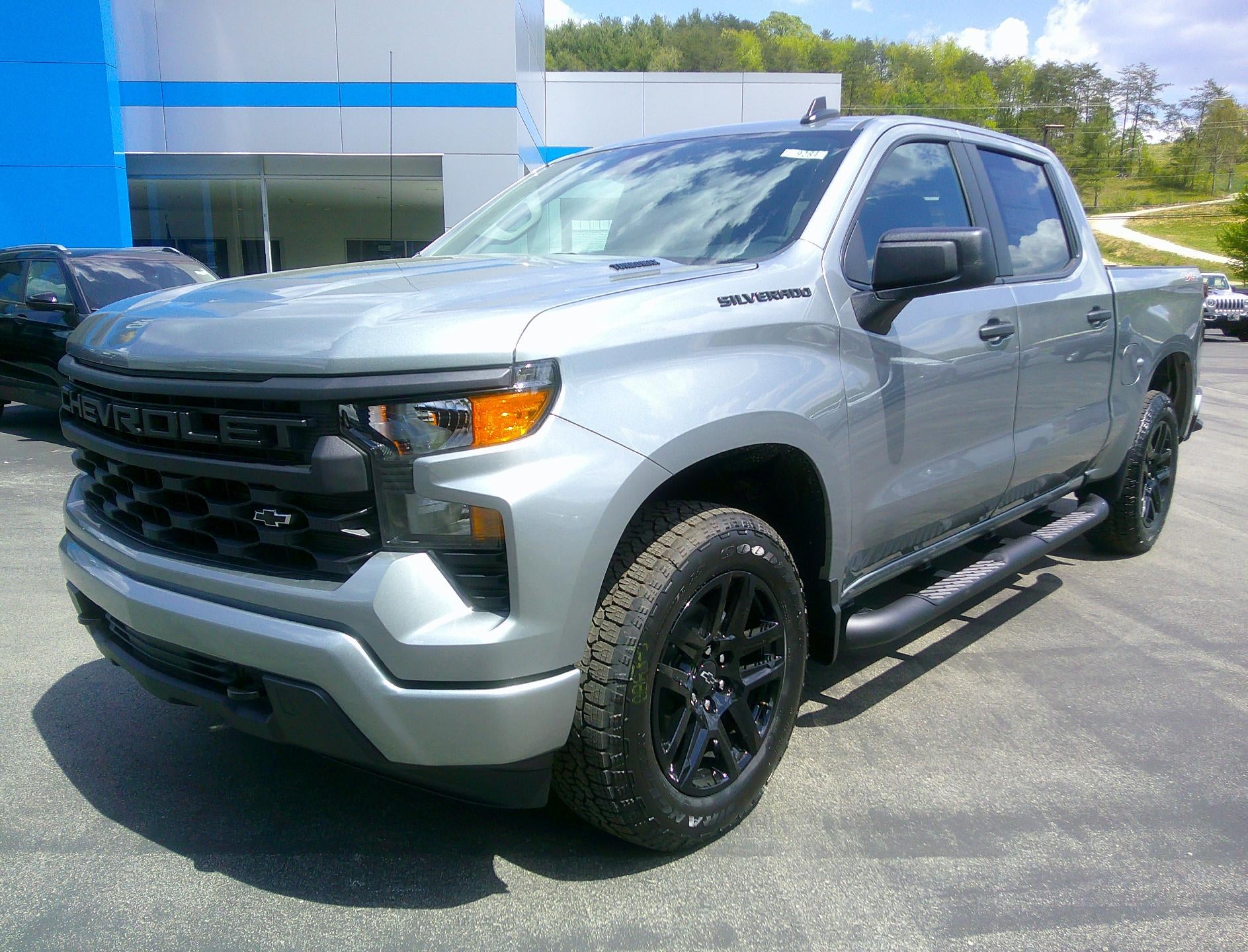 2026 Chevrolet Silverado 1500 Custom in Sterling Gray Metallic — front three-quarter view