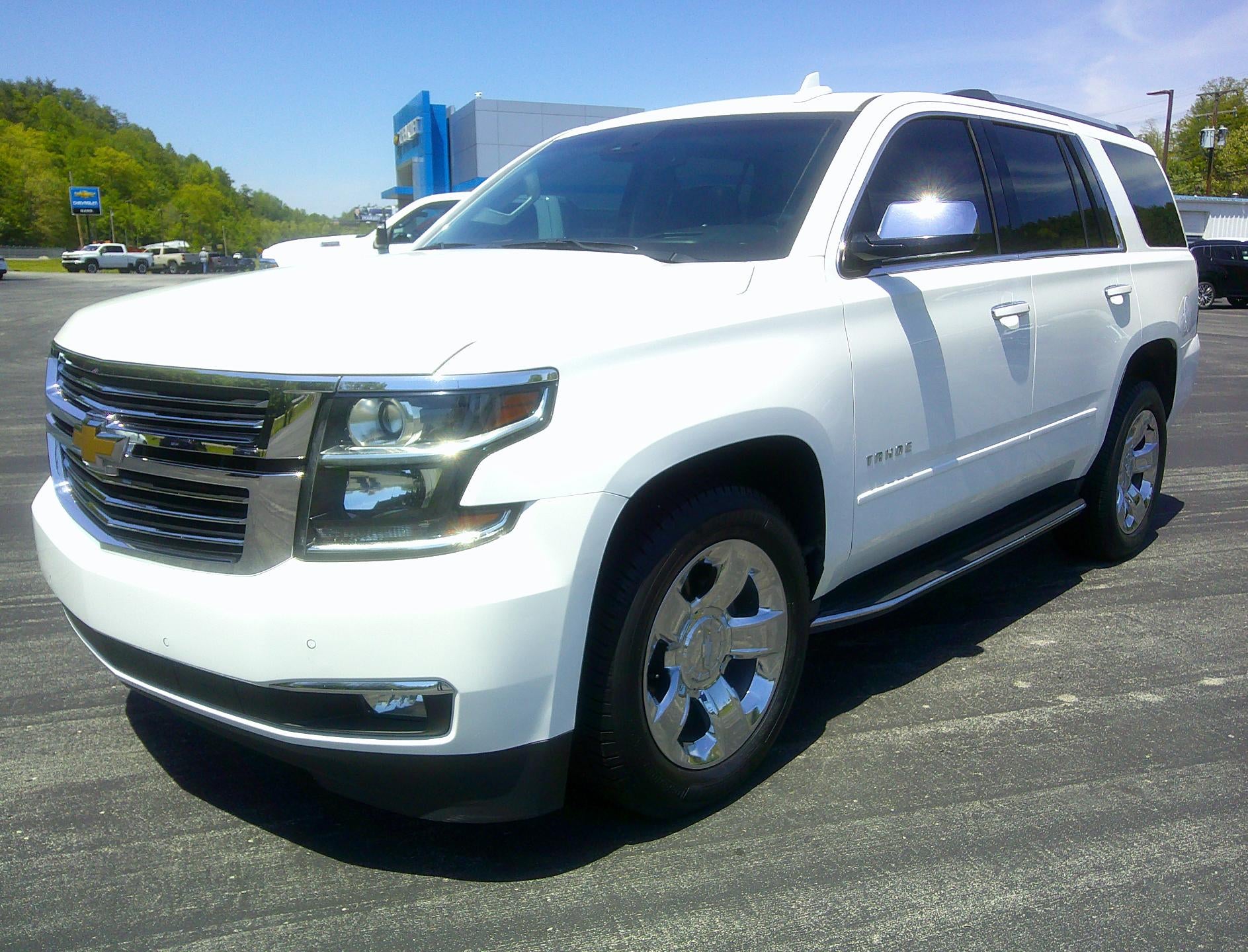 2017 Chevrolet Tahoe Premier in Summit White — front three-quarter view