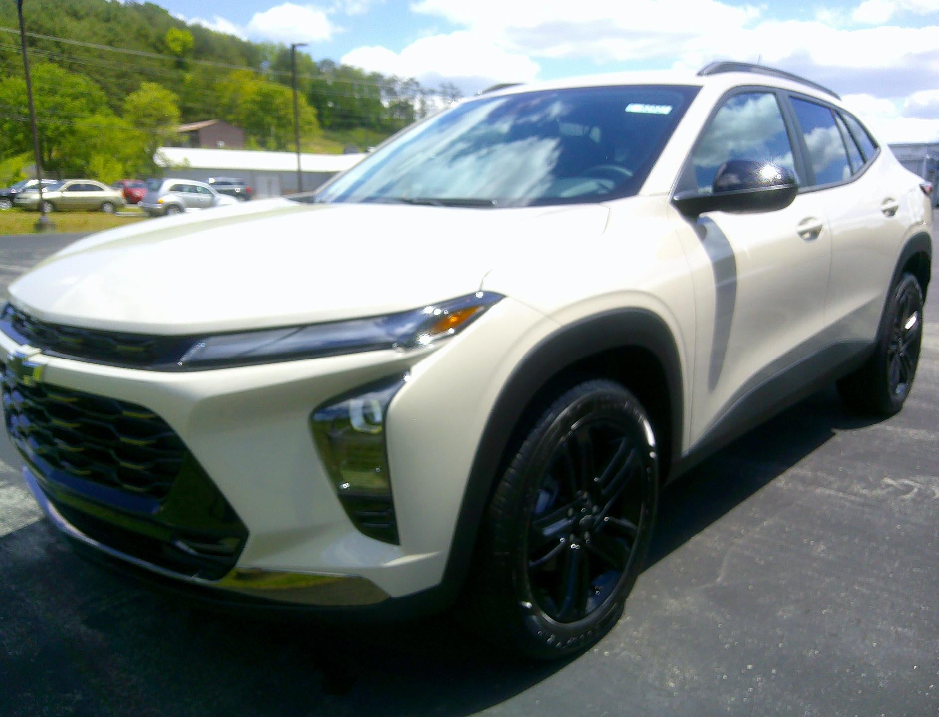 2026 Chevrolet Trax ACTIV in White Sands — front three-quarter view